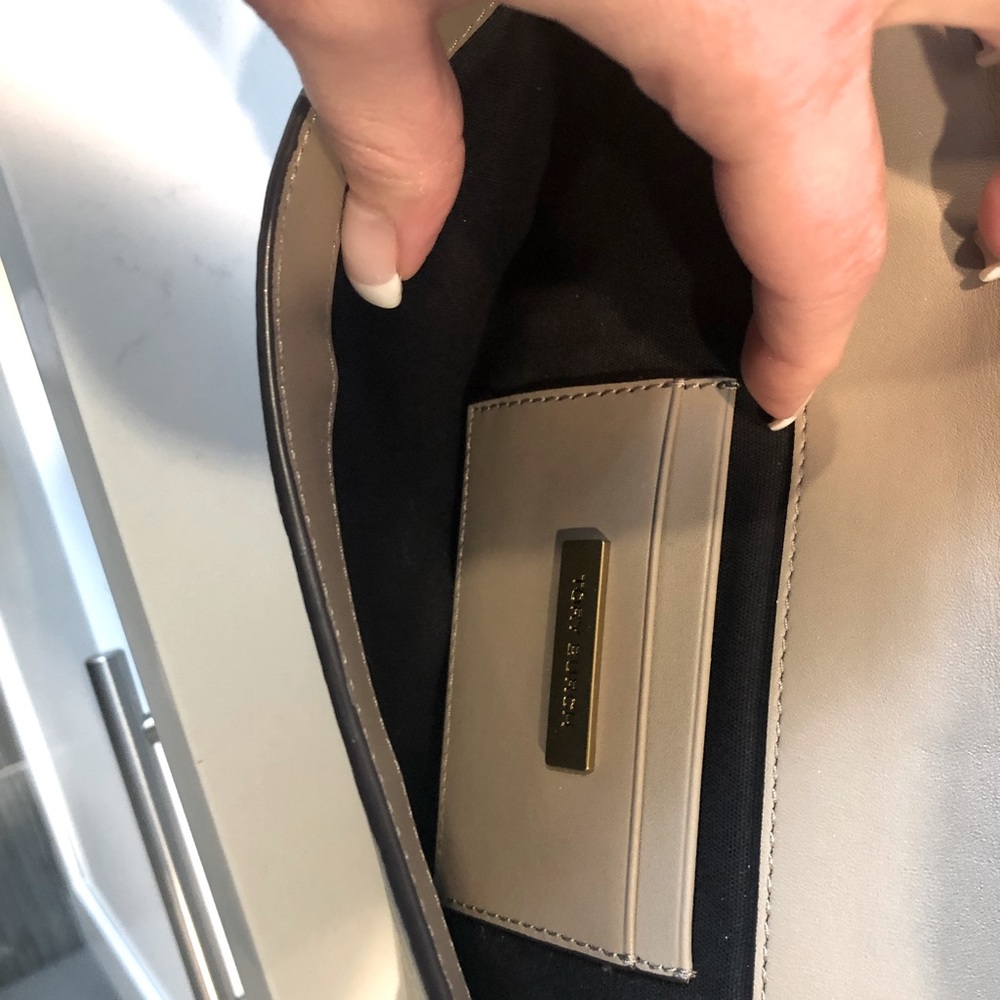 A gorgeous Tory Burch leather clutch.